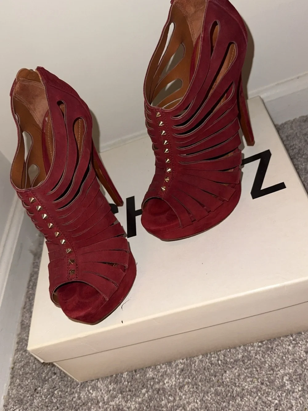 SCHUTZ Burgandy high heel with gold spikes